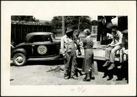 American Women's Hospitals, Rural Services mobile clinic vaccinating a man (photograph), circa 1935<blockquote class="juicy-quote">An American Women’s Hospital doctor ( in “AWH” armband) administers a shot to a local man in Jellico, Tennessee.</blockquote><div class="view-evidence"><a href="https://doctordoctress.org/islandora/object/islandora:1859/story/islandora:2088" class="btn btn-primary custom-colorbox-load"><span class="glyphicon glyphicon-search"></span> Evidence</a></div>
